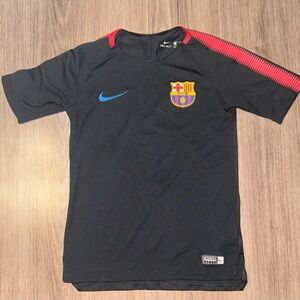 Nike Kids Black Jersey with Red and Blue Accents